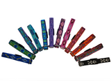 Lupine small dog collars in various patterns including dog bone, turtles, peacock feather, flowers, swirls, hearts and more. In a range of colors of blue, purple, orange, pink and black.